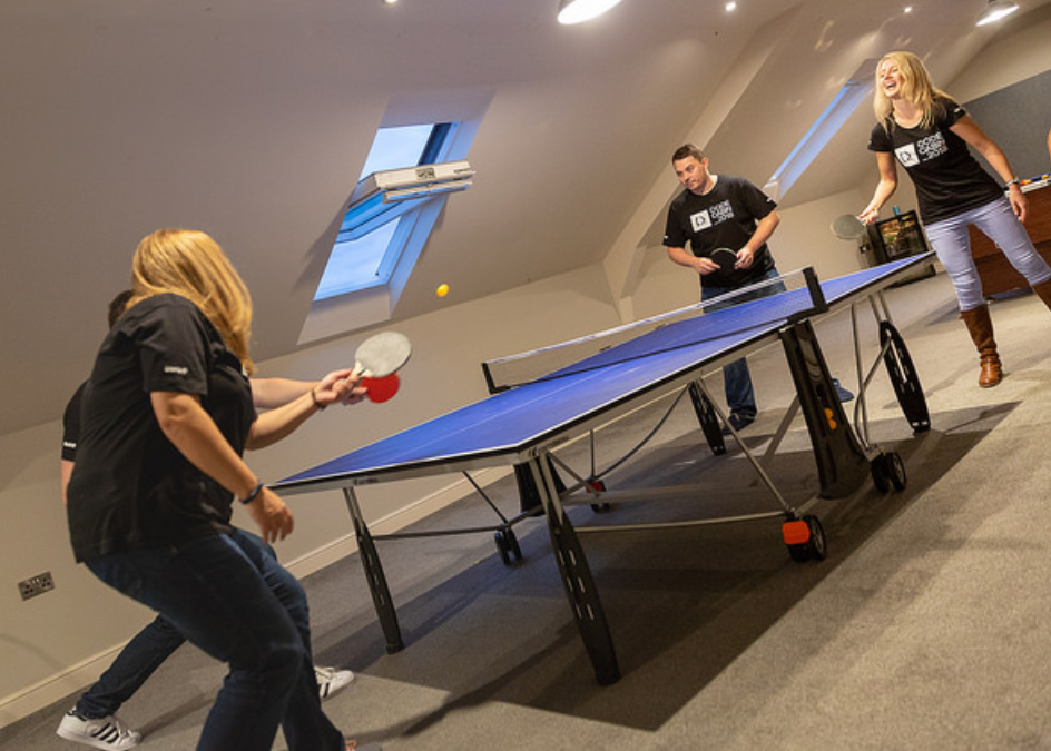 People playing table tennis at CODECABIN